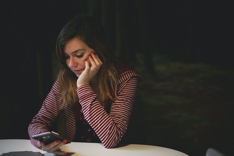 young woman texting