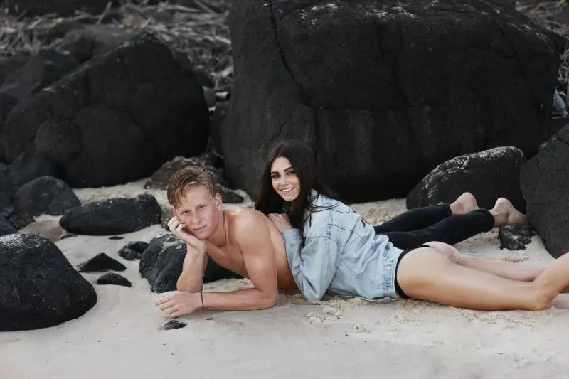 couple laying on the beach