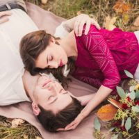 couple in love lying on the grass
