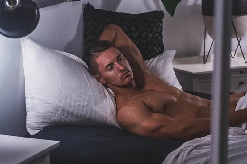 man lying in bed