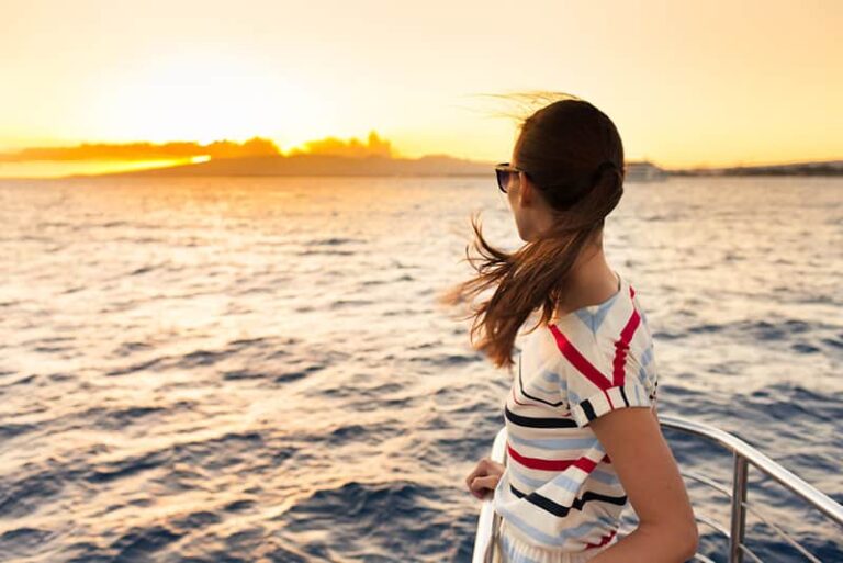 young woman watching the sunset
