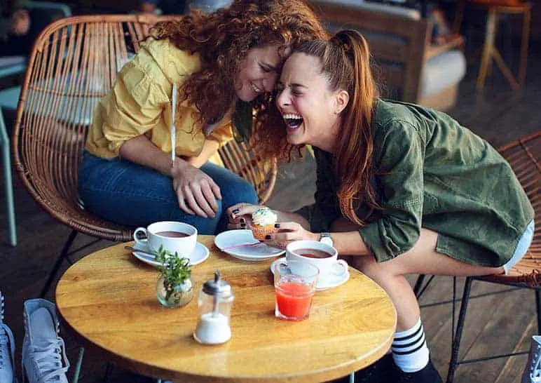 friends laughing together on coffee time