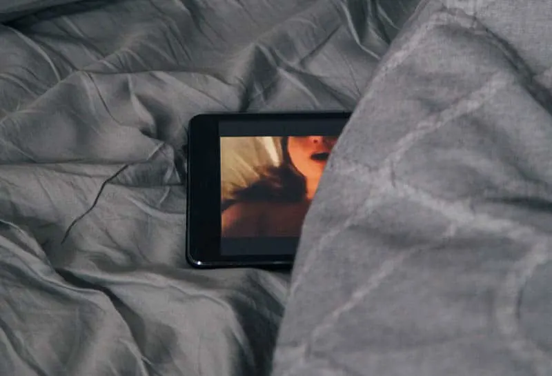movie on the tablet in the bed