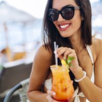 sexy woman holding coctail