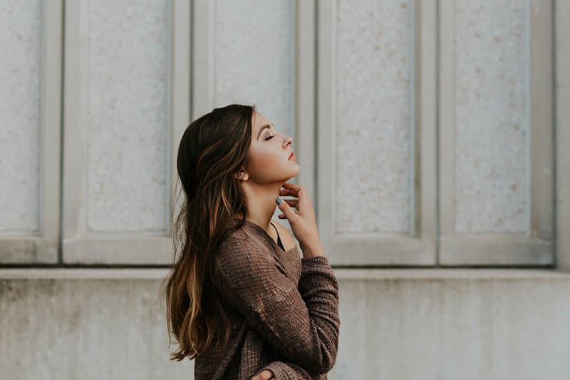 young woman in deep thoughts