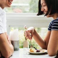 smiling couple at cafe