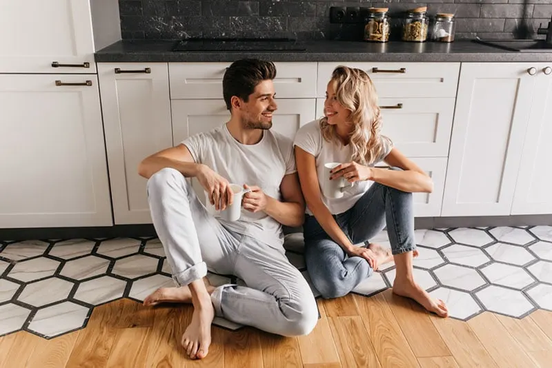 couple talking on the kitchen floor