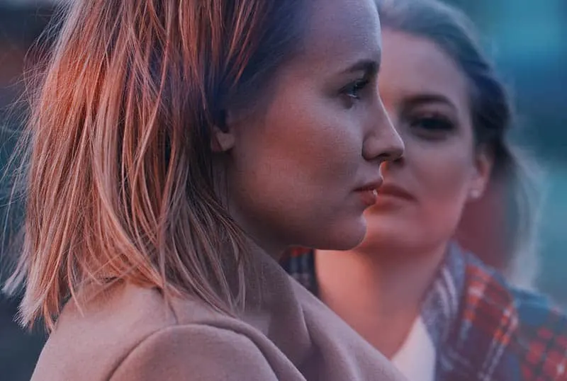 woman watching another woman
