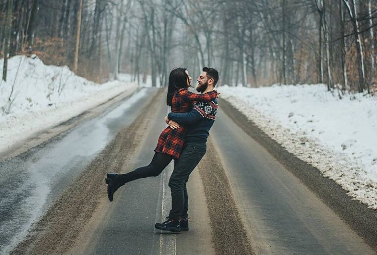 man hugging his wife