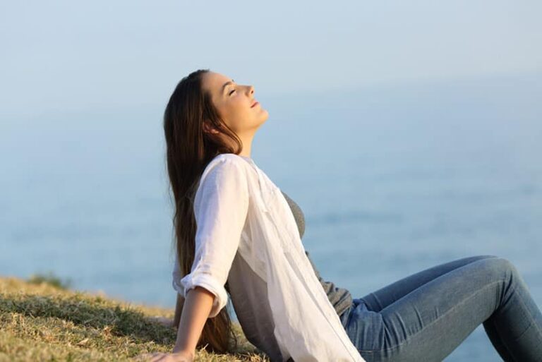 calm woman sitting outdoor