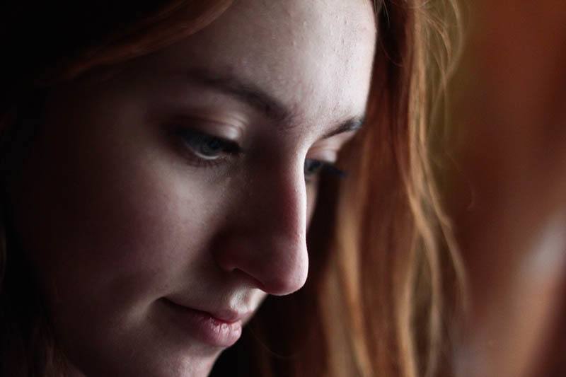 close up photo of sad woman's face