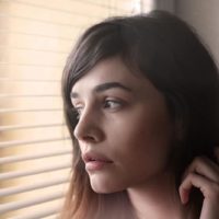 sad beautiful woman looking at distance