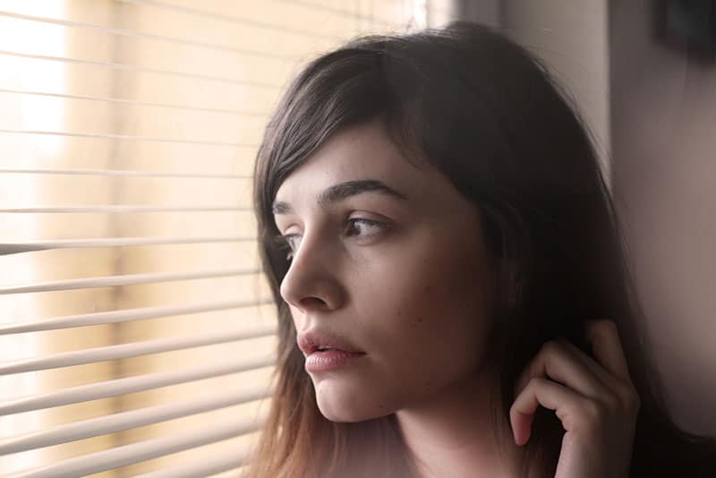 sad beautiful woman looking at distance