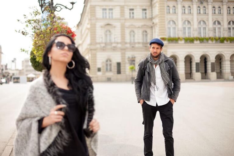 man looking at attractive woman