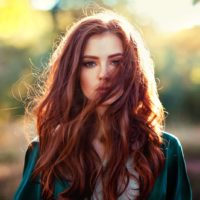 a woman with long red hair