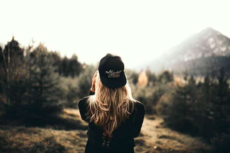 blonde woman with cap