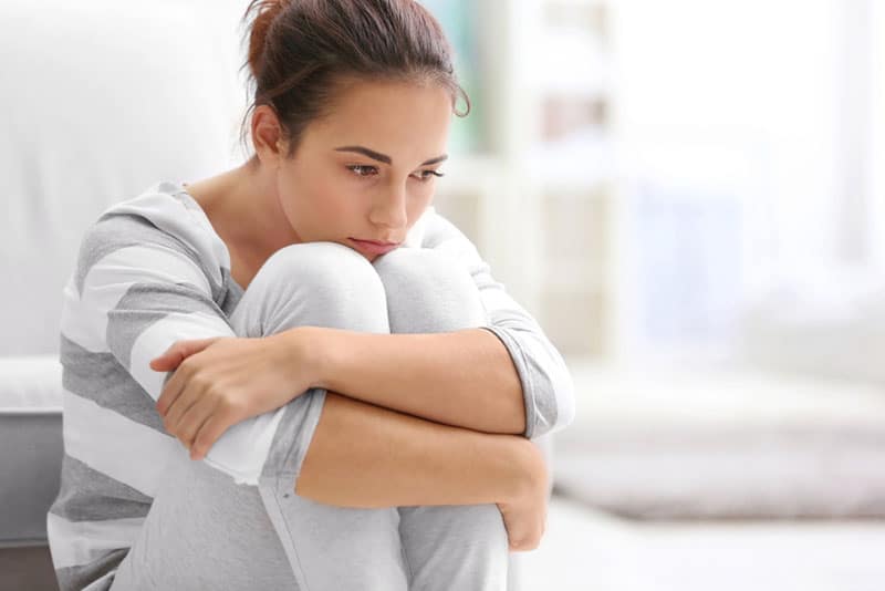 lonely woman in deep thoughts