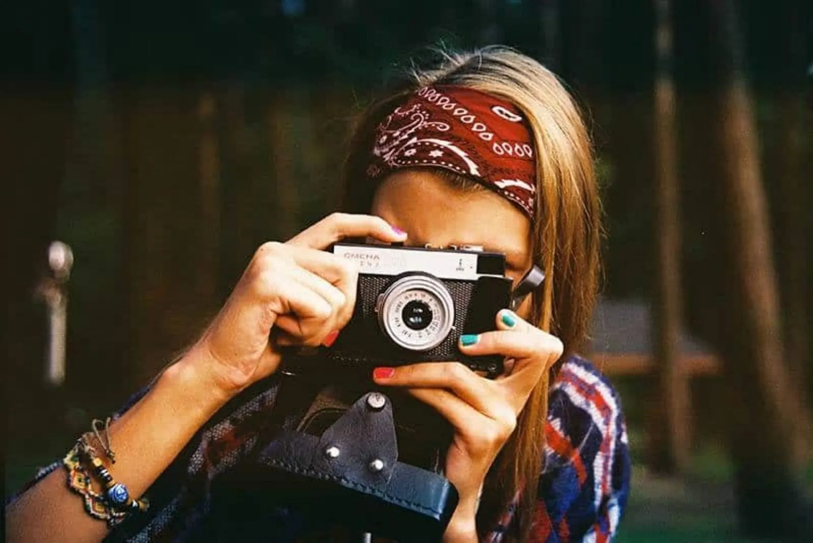 woman taking a shot with her camera