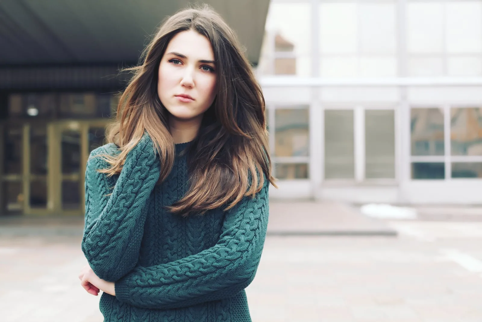 woman wearing woolen green sweater 