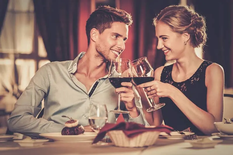 young couple flirting in restaurant