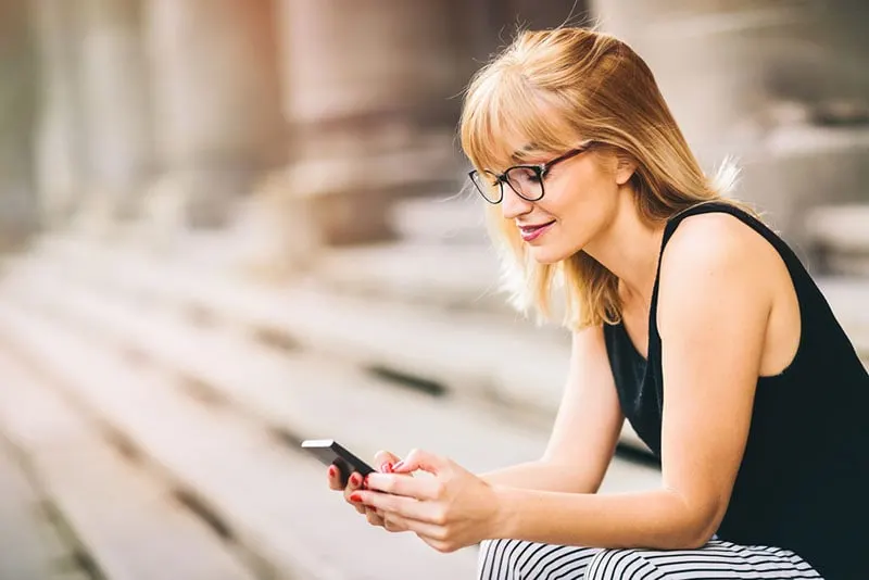 young woman texting