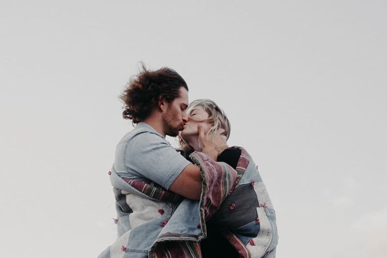 couple kissing passionate outdoor