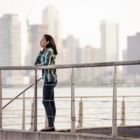 woman standing on the waterfront