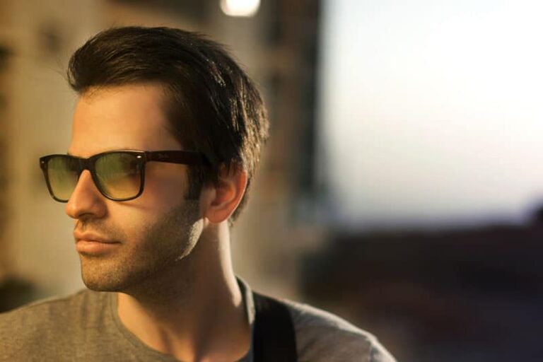 man with sunglasses looking away