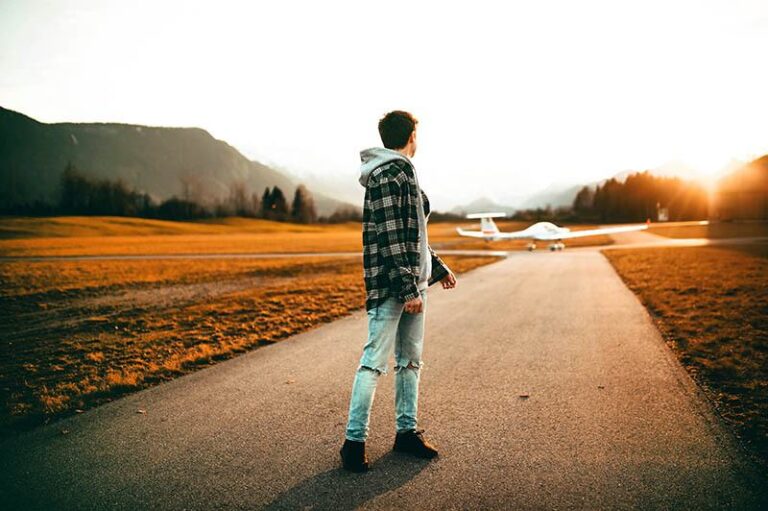 man walking down the street