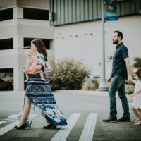 mother and father walking with kids