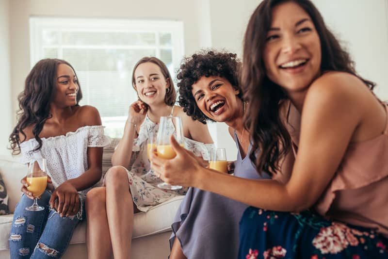 friends laughing and drinking