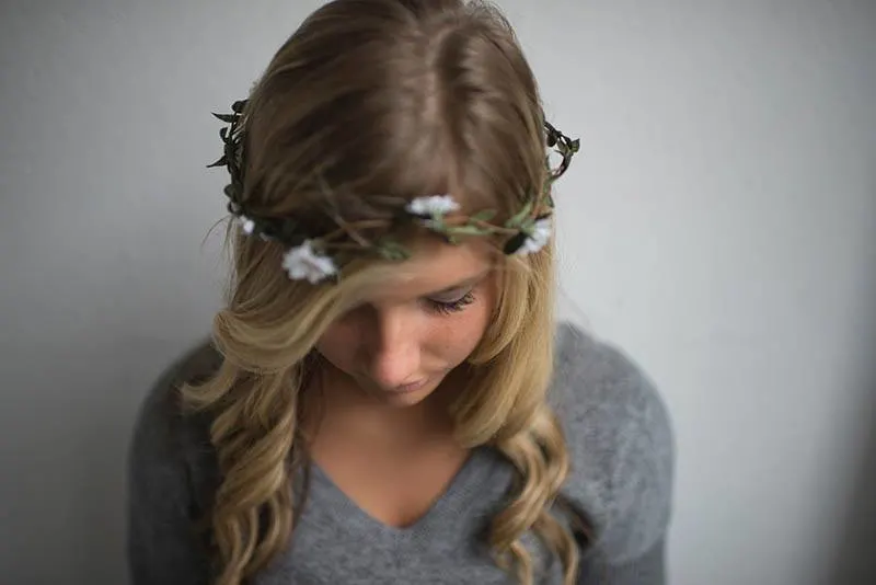 girl with small wreath over her head