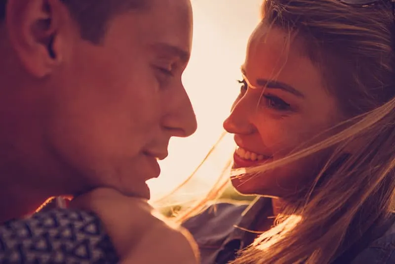 man looking at woman eyes