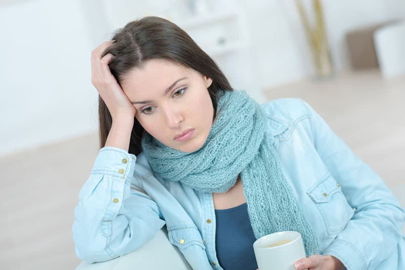 sad mindful woman staring at distance