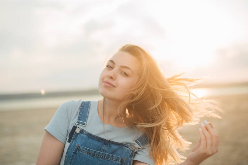 woman walking outside during sunset