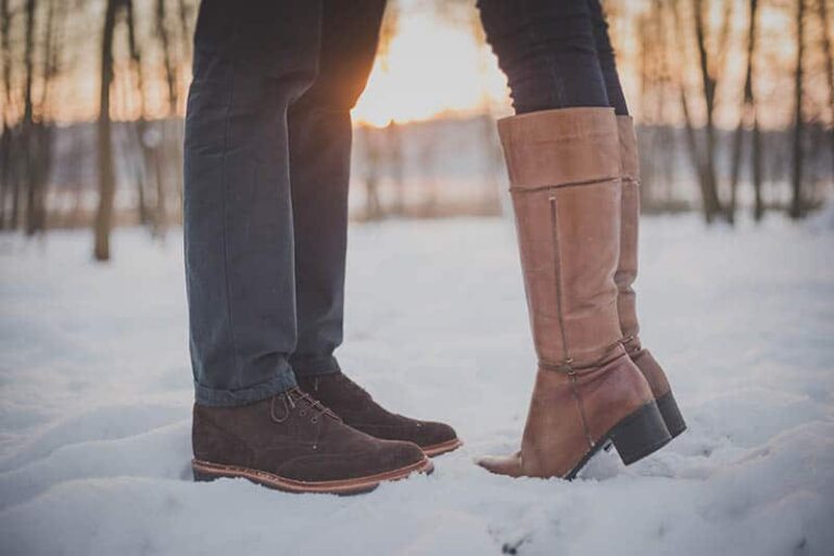 close up photo of man and woman shoes