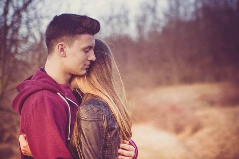 couple hugging outside