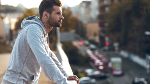 handsome man with earphones in his ears