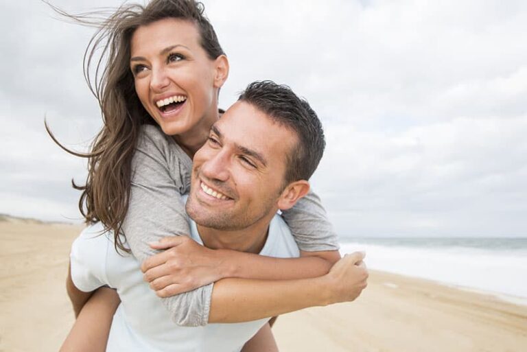 happy couple on the beach
