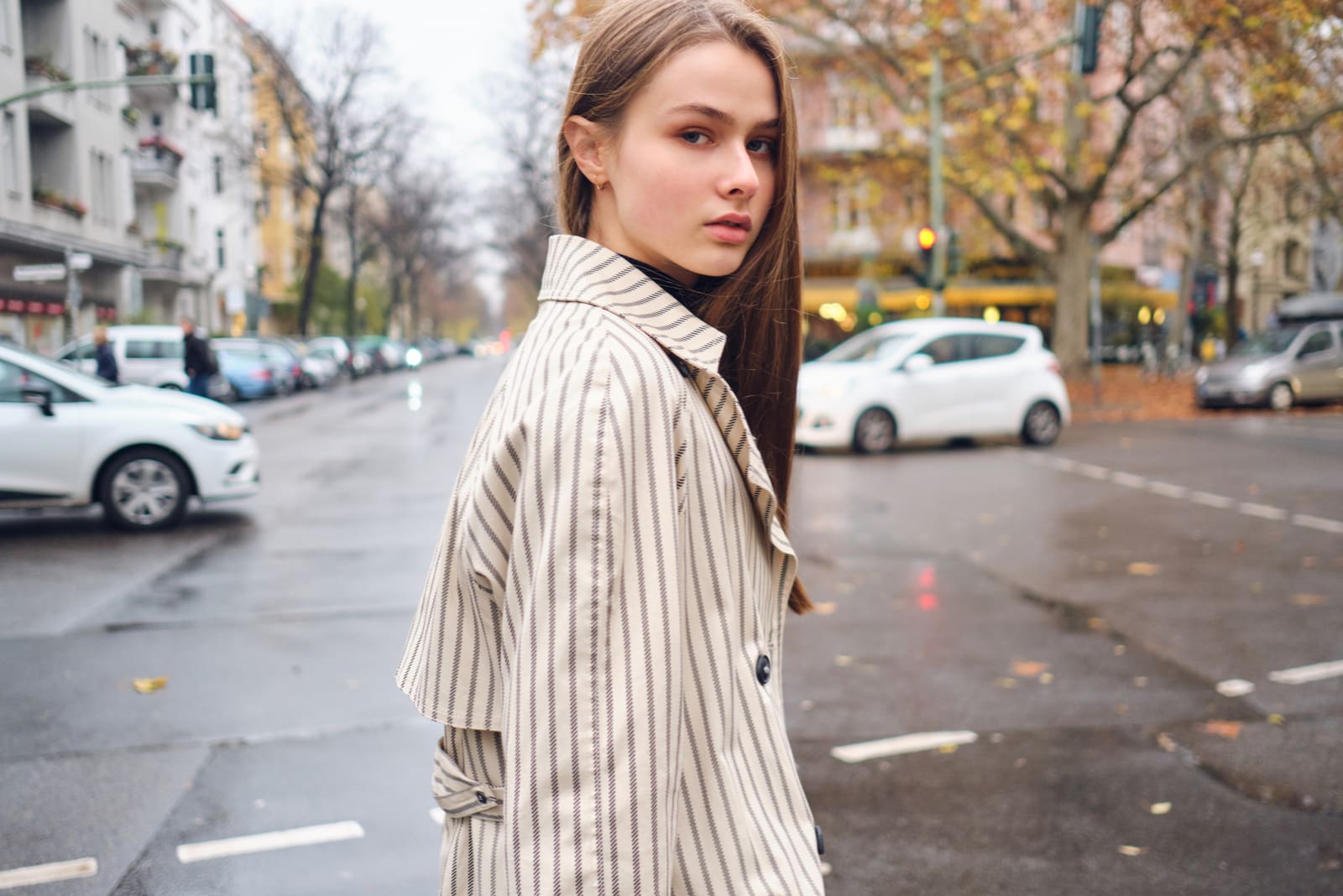 a woman standing in the street