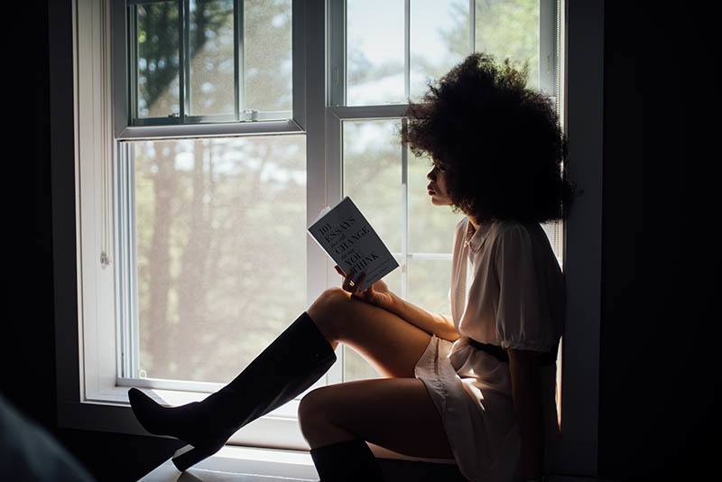attractive woman reading a book