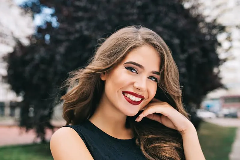 attractive woman with red lipstick posing