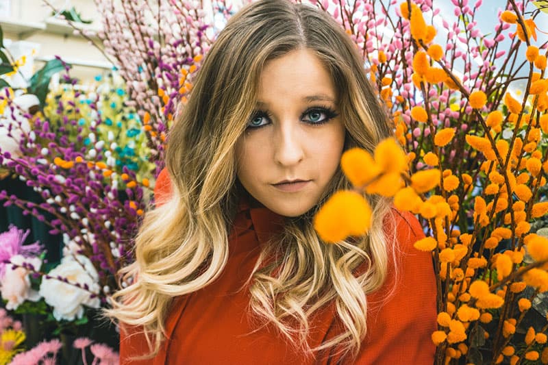 blond woman posing with make up