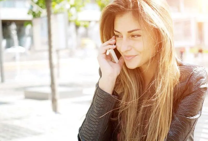 cute female talking on phone