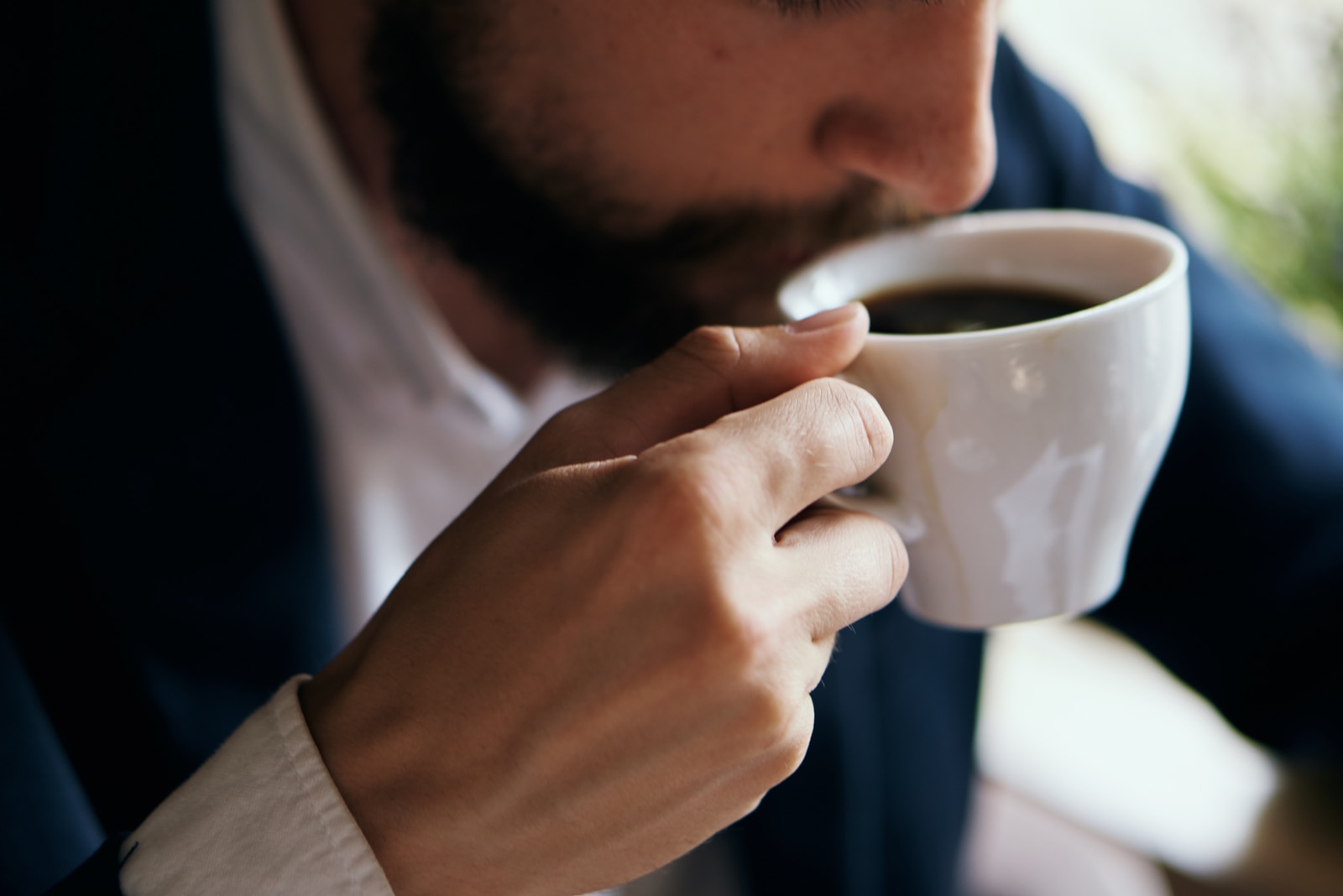 man drinking coffee