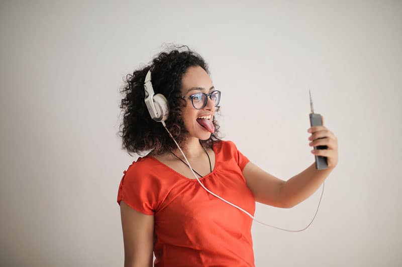 sassy woman getting picture of herself