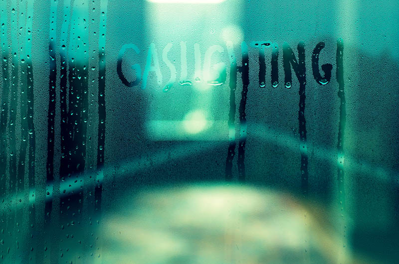 sign of gaslighting on wet glass