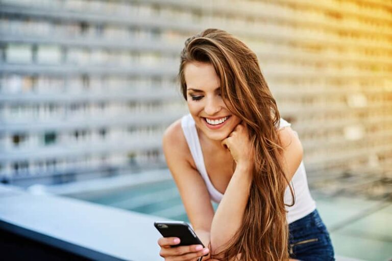 happy woman typing a message