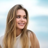 cute young woman standing outdoor