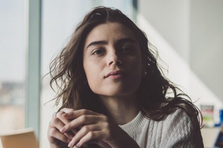 young beautiful brunette wearing sweatshirt